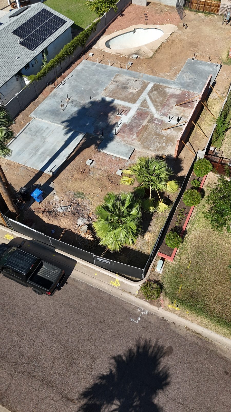 Aerial view of the property with the new foundation poured and utilities stubbed